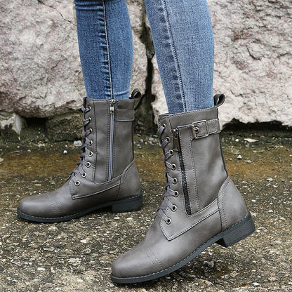 Orthopädische Damenstiefel aus Leder mit seitlichem Reißverschluss, ideal für Herbst- und Wintertage.