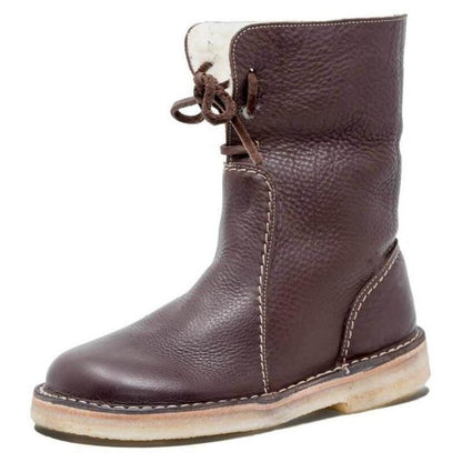 Wasserdichte Winterstiefel für Frauen, ideal für kalte Herbst- und Wintertage, mit warmem Futter und rutschfester Sohle.