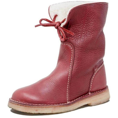 Wasserdichte Winterstiefel für Frauen, ideal für kalte Herbst- und Wintertage, mit warmem Futter und rutschfester Sohle.